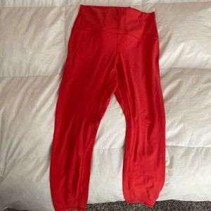 Reddish orange lululemon 25” ankle length yoga pants